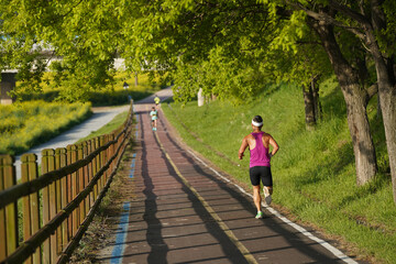 Fototapeta na wymiar A man jogging in the early morning