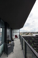 Architecture contemporary, balcony of a building. Table servwd with wine for two persons