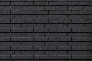 ダークブラウン色のタイル壁