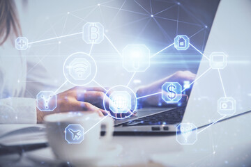 Double exposure of woman hands typing on computer and social network theme hologram drawing. People media concept.