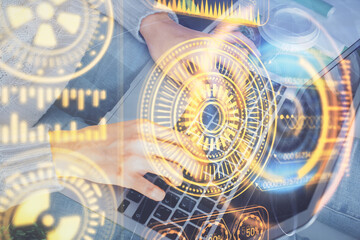Double exposure of woman hands typing on computer and technology theme drawing. High Tech concept.