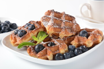 Traditional belgian waffles with fresh fruit  or american waffles delicious sweet dish, dessert snack menu concept