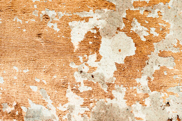 Texture of a concrete wall with cracks and scratches which can be used as a background