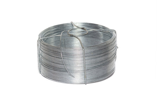 Coil of Tie Wire, galvanized metal joiner, hardware. Isolated on a white background. Spool of wire.