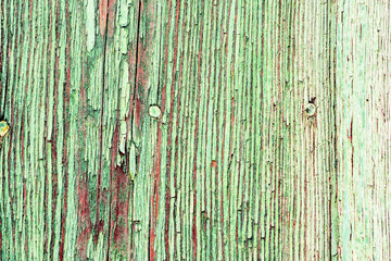 Wooden texture with scratches and cracks. It can be used as a background