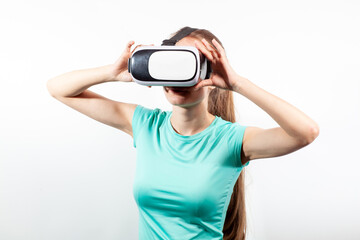 Girl in virtual reality glasses watching surprised shocking video. Young woman looking at futuristic social network map concept