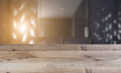 Spacious bathroom in gray tones with heated floors, freestanding tub. 3D rendering.. Sunset.. Abstract blur phototography. wooden table on blurred background.