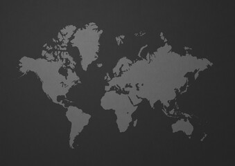 White world map on black wall background