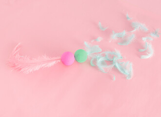 Couples, husbands and wives, fight, quarrel, creative concept, marriage issues; two colorful birds against pastel pink background.
