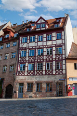 Obraz premium Tiled roofs and half-timbered houses in the historic center Nuremberg City, Germany