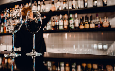two red wine glass in cafe or bar