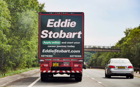 Monmouth, Wales - September 2018: Rear of a lorry operated by the Eddie Stobart haulage company on a dual carriageway near Monmouth