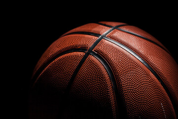 Basketball ball for street basketball game. Studio photo on a black background, close-up.