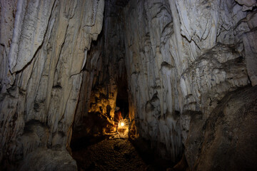 Beautiful nature of a cave, Magnificent entrance into the cave, Woman In Cave