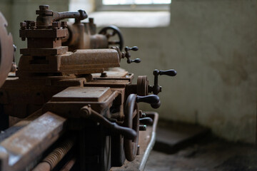 Old industrial machinery in a disused warehouse
