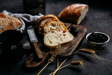 Homemade Ciabatta Bread. Bread with olives - obrazy, fototapety, plakaty