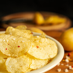 Delicious snack food skin potato chip french fries salad from fresh slice cut chopping by hand raw organic bio sweet potatoes homemade authentic cook healthy oil free bake with salt mayonnaise vegan