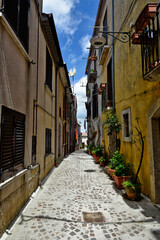 Nusco, Italy, May 8, 2021. A small street among the picturesque houses of a medieval village in the province of Avellino.