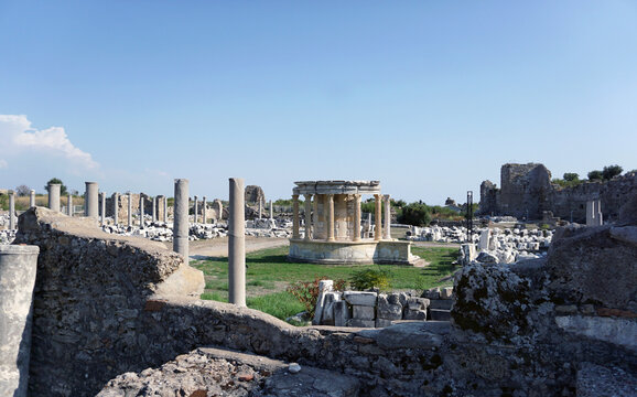 Side / Turkey - October 16 2019: Sights of Turkey and memorable places. The ruins of the ancient city of Side. Vespasianus Ant. A magnificent and unforgettable vacation in Turkey.    