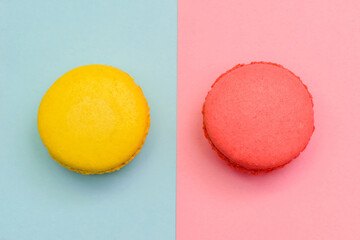 two color macaron cakes on a two paper color background