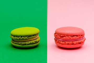 two color macaron cakes on a two paper color background