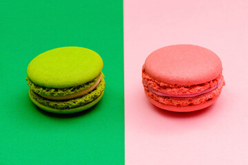 two color macaron cakes on a two paper color background