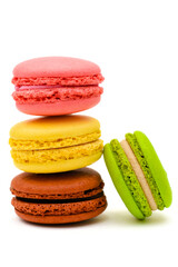 several color macaron cakes on a white background