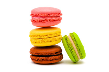 color macaron cakes on a white background