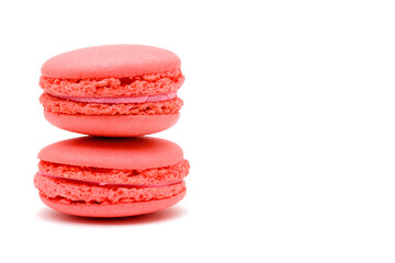 two rose macaron cakes on a white background