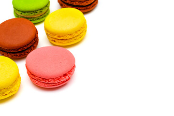 color macaron cakes on a white background
