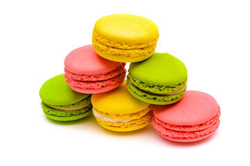 color macaron cakes on a white background