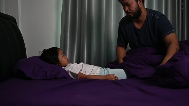 Father day concept,Asian dad and daughter use time together at home