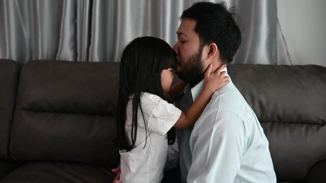 Father day concept,Asian dad and daughter use time together at home