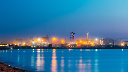 Batumi, Adjara, Georgia. Port Dock On Sunny Evening Or Night At Illuminations Light