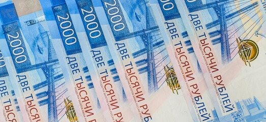 Money background. Banknote 2000 Russian rubles. Cash loan. Selective focus.