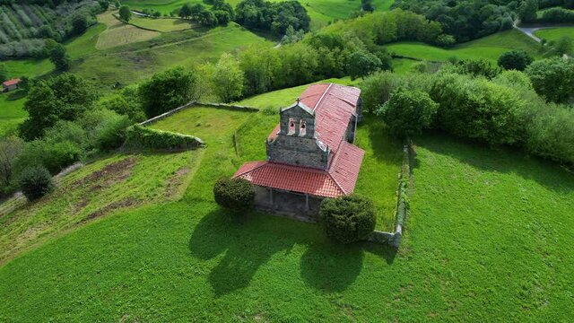 Aerial view from a drone of the hermitage of San Vicente, between Esles and Lloreda in the municipality of Santa Mar&iacute;a de Cayon in the Valles Pasiegos. Cantabria, Spain, Europe