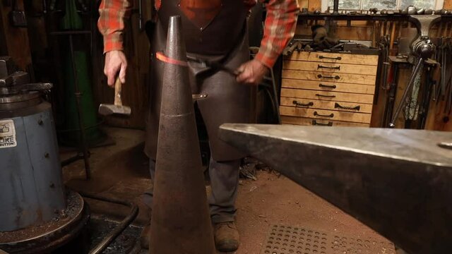 Blacksmith forging ring on cone mandrel 2