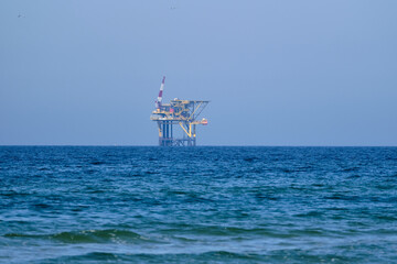 Ameland,Netherlands April 20,2021-NAM, Oil rig, offshore platform with sea water. Natural gas...