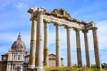 Obraz premium Ruins of Temple of Saturn at Roman Forum, a forum surrounded by ruins in Rome, Italy