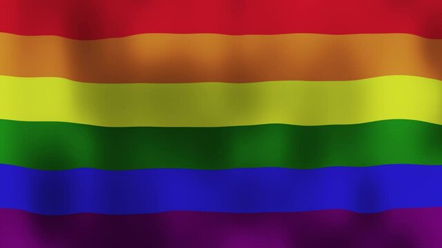 The rainbow flag, LGBT LGBTQ pride flag for gay pride flag waving at wind. LGBT symbol flag of different colors