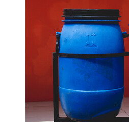 Blue trash can made from used buckets. Creativity like this is very good for the younger generation.