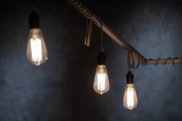 vintage light bulbs hang from ceiling for interior.