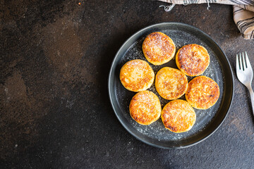 cottage cheese pancake cheesecake curd breakfast dessert sweet syrniki healthy meal top view copy space rustic food background rustic. top view