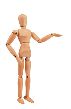Wooden man drawing mannequin figure model concept is presenting something isolated on white background