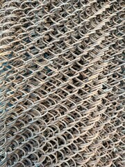 Texture of rusty mesh netting.