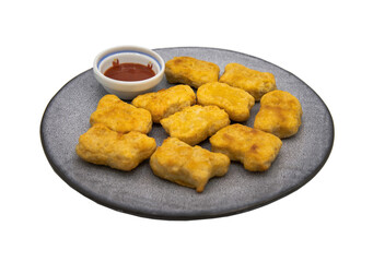 Set of tasty Fried chicken breast nuggets and Sauces in plate isolated on white background with clipping path. Top view, Selective focus.