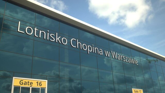 Airliner take off reflecting in the windows with Lotnisko w warszawie or Warsaw Chopin Airport text