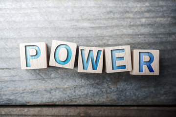 Fototapeta premium Power Written On Wooden Blocks On A Board
