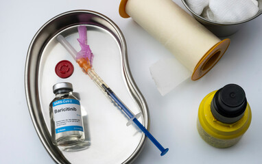 Medication prepared for people affected by Covid-19, baricitinib as a treatment for patients infected in experimental use, conceptual image