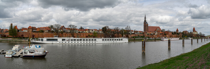 Fototapeta premium Panoramic view of harbor on the Elbe River in a historic town of Tangermuende. The northeastern part of Saxony-Anhalt state, Germany.